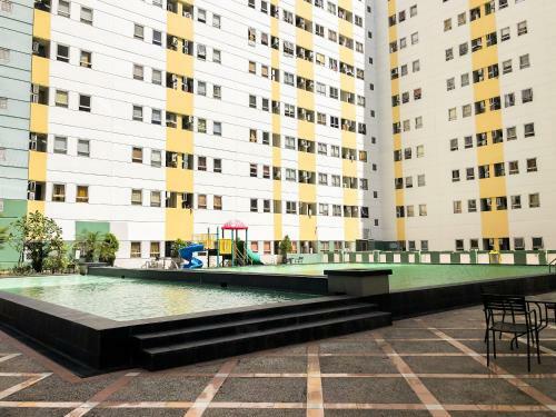 Strategic Studio Apartment At Puncak Permai By Travelio