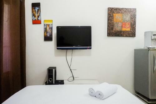 Strategic Studio Apartment At Puncak Permai By Travelio