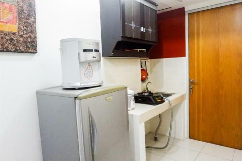 Strategic Studio Apartment At Puncak Permai By Travelio
