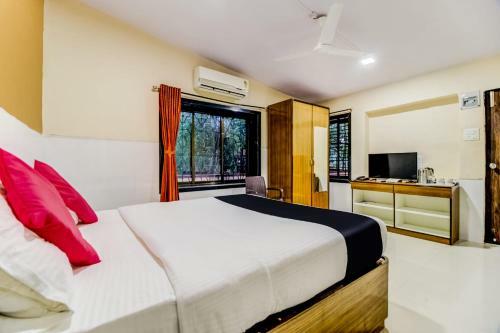 Hotel Capital O 46872 Gunwant Holidays