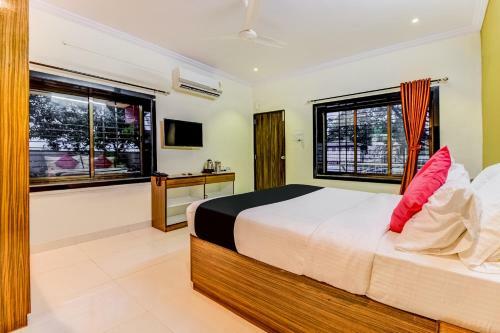 Hotel Capital O 46872 Gunwant Holidays