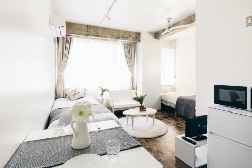 Apartamentos Pack Studio Tanaka