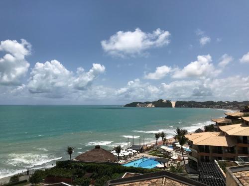 Apartamento Costeira Praia - Belo Flat II (115)