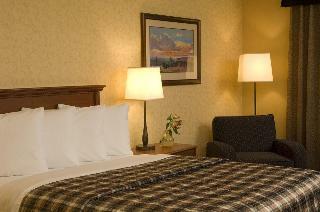 Merit Hotel & Suites