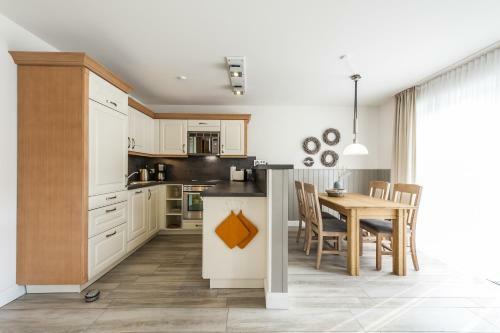 Apartamento Ferienwohnung "b�sumer Reethus"