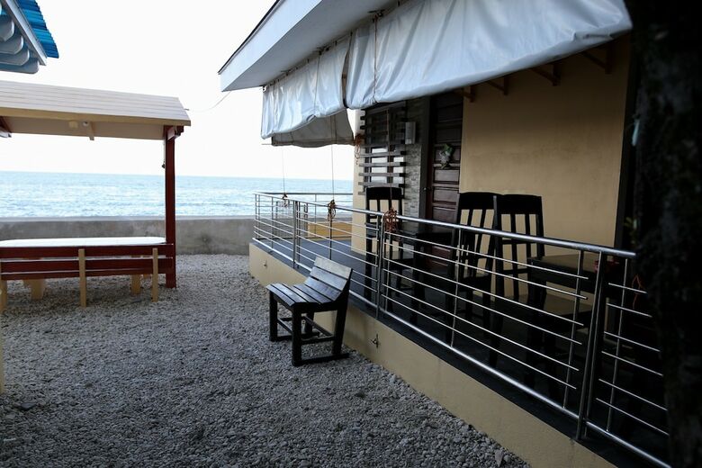 Hotel Luzmin Bh - Beachfront Cottages
