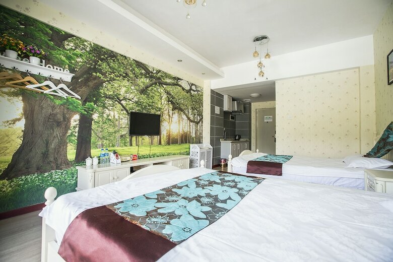Jinghong Gaozhuang Anni Holiday Hotel