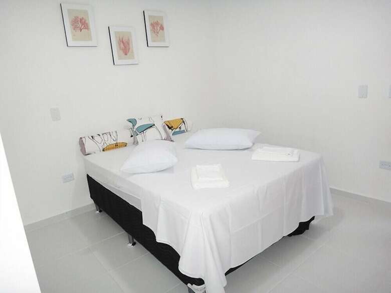 Hotel Urbano Su�tes