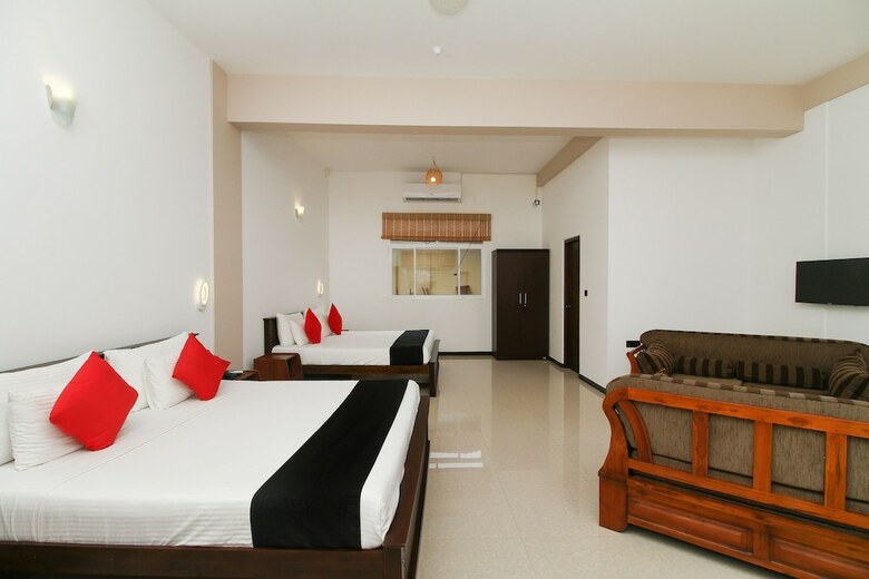 Hotel Capital O 311 Grace Beach Resort