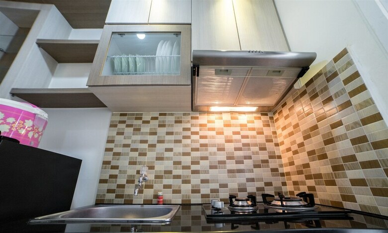Serene & Cozy Apartment At Parahyangan Residences