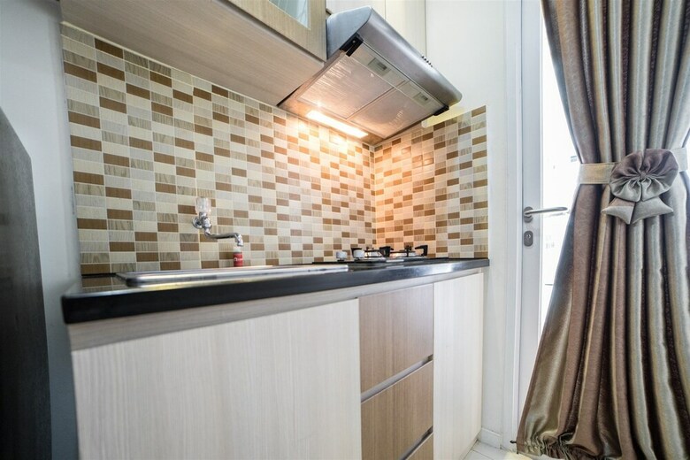 Serene & Cozy Apartment At Parahyangan Residences