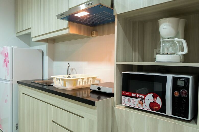Studio Room Azalea Suites Apartment