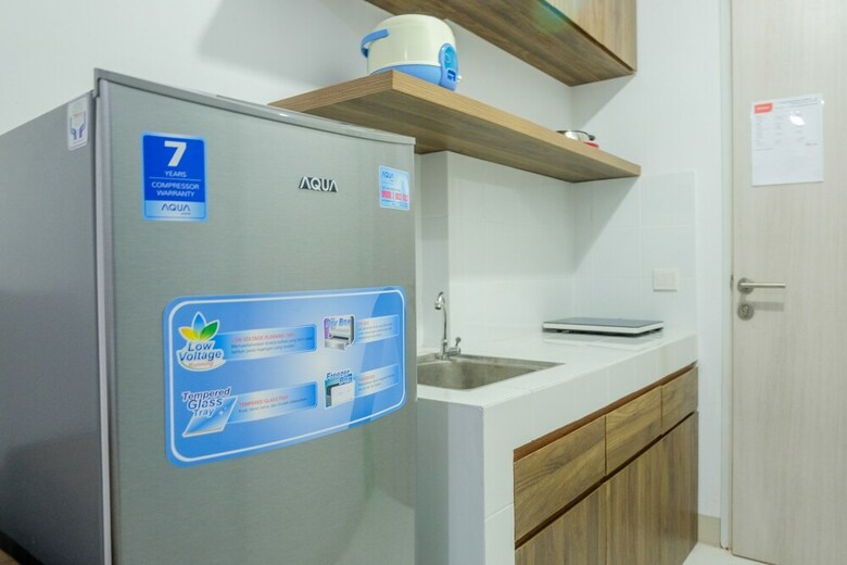 Comfortable Studio Azalea Suites Apartment