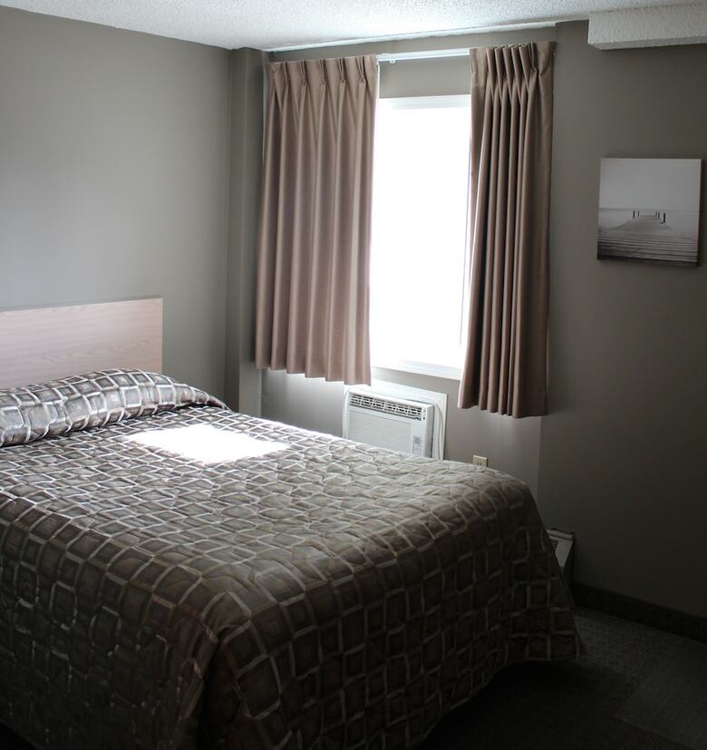 Motel Arbour Ridge Inn & Suites