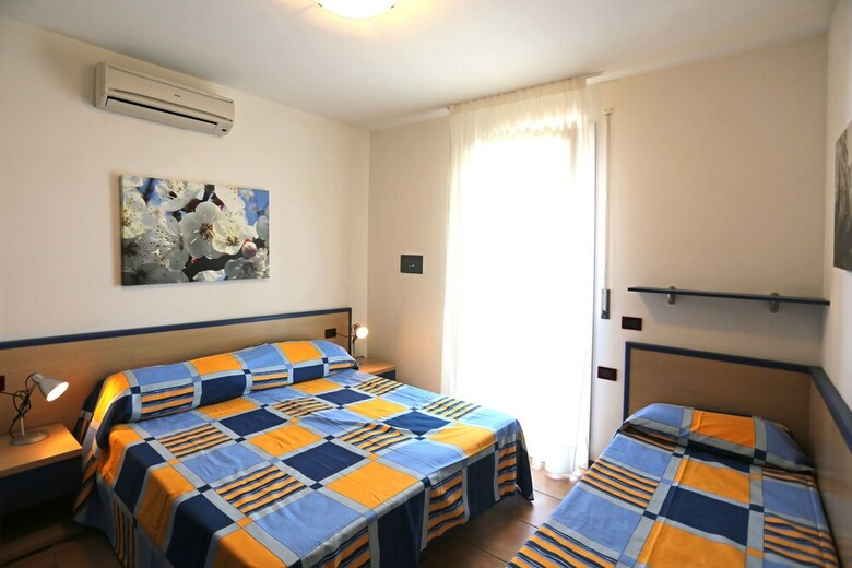 Apartamento Villaggio Pini