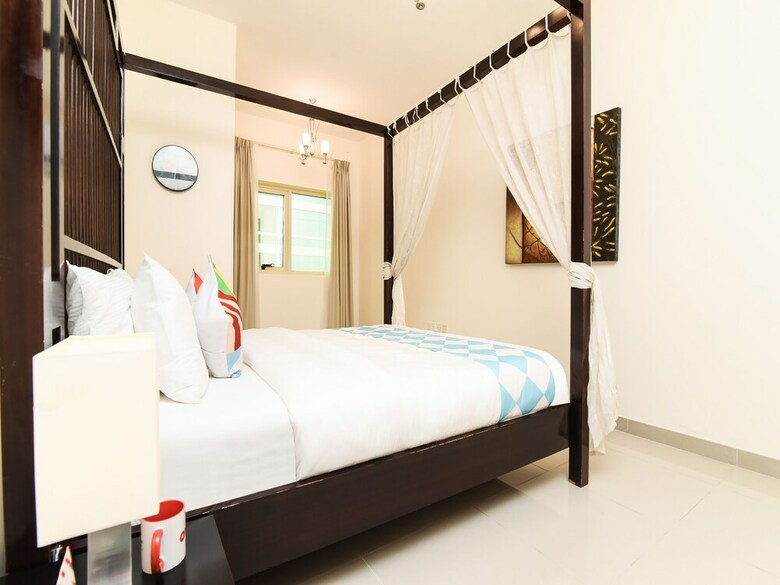 Apartamento Oyo 243 Home Marina Suites 1br