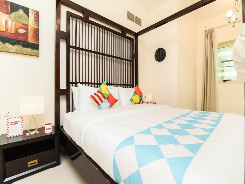 Apartamento Oyo 243 Home Marina Suites 1br