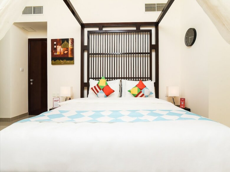 Apartamento Oyo 243 Home Marina Suites 1br