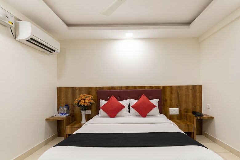 Hotel Capital O 49120 Ak International