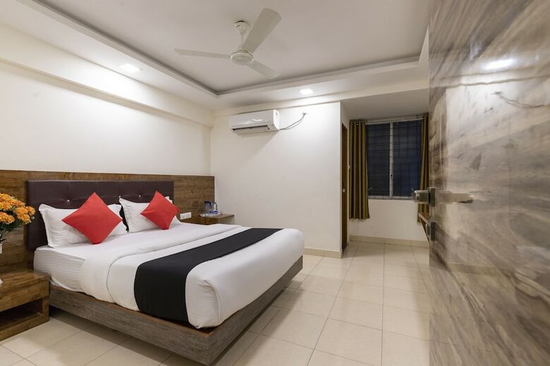 Hotel Capital O 49120 Ak International