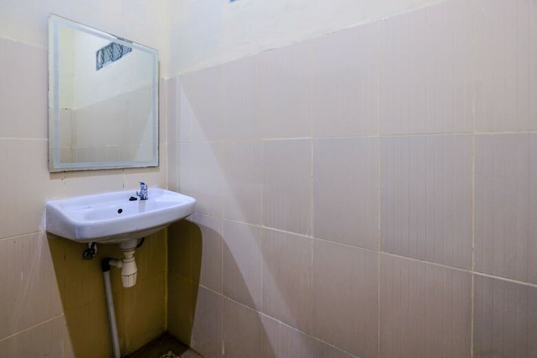 Hostal Oyo 2864 Mangsit Garden Homestay