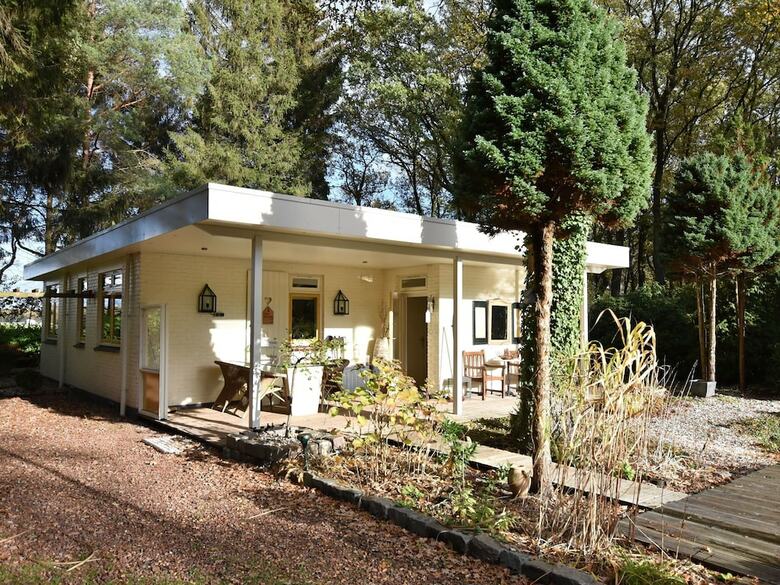 A Detached Bungalow With Outdoor Fireplace, Covered Terrace And Pond In A Forest Plot