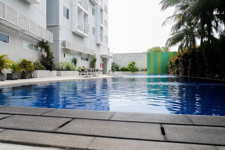 Minimalist Style Studio Room At Uc Apartment Surabaya