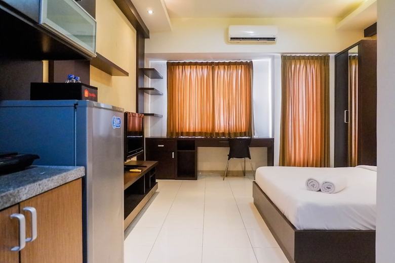 Minimalist Style Studio Room At Uc Apartment Surabaya