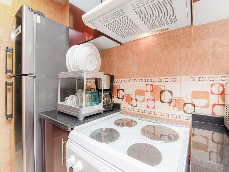 Apartamento Oyo 242 Home Marina Suites 2 Br