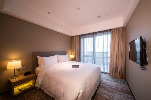 Apartamento Howard Johnson Jinghope Serviced Residence Suzhou