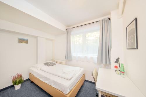 Hotel Horn� Pramen