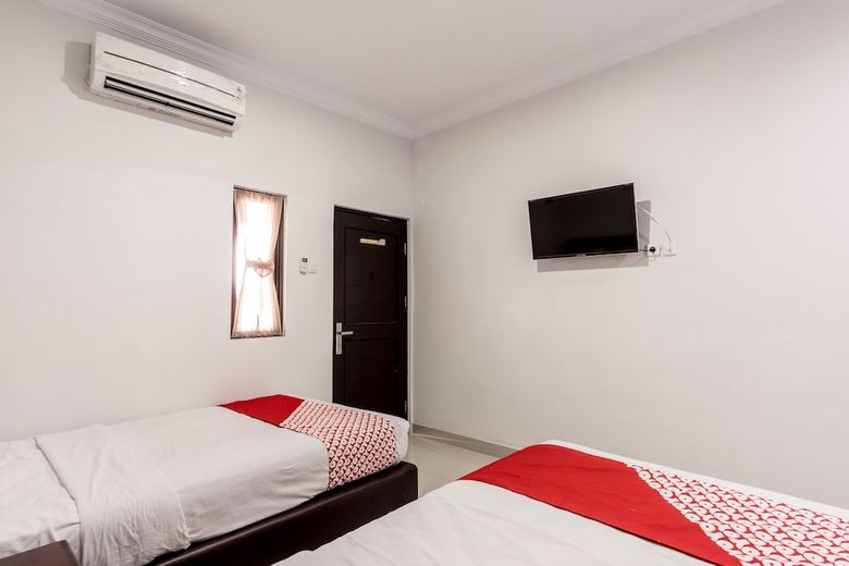Hostal Oyo 283 Helvetia Residence