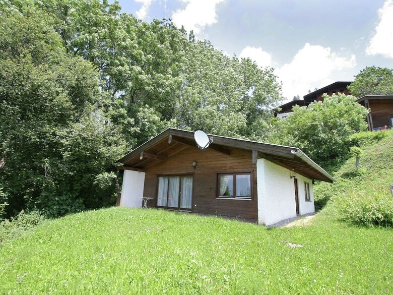 Quaint Chalet With Garden, Terrace, Fireplace,play Equipment