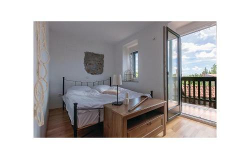 Four-bedroom Holiday Home In Komen