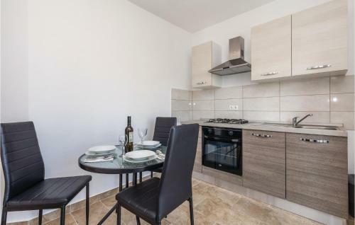 Two-bedroom Apartment In Povljana