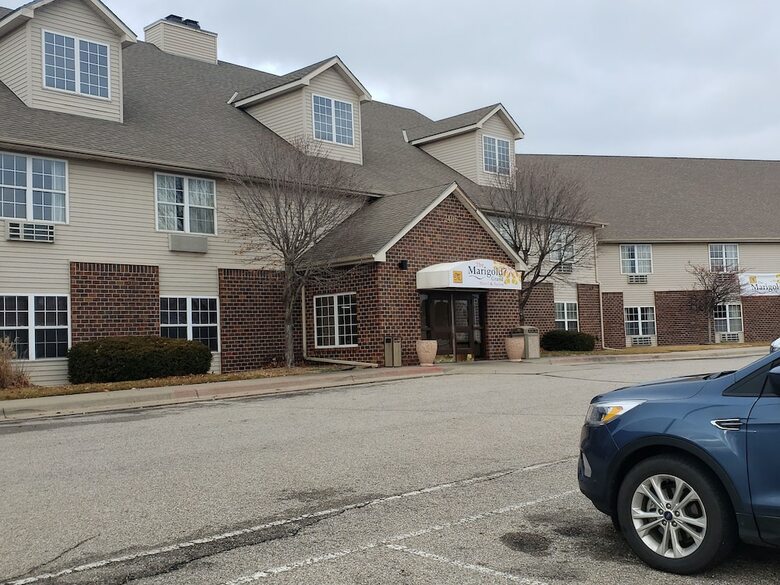 The Marigold Grand Hotel And Suites