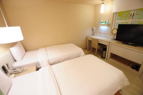 Kindness Hotel - Houyi Jiuru