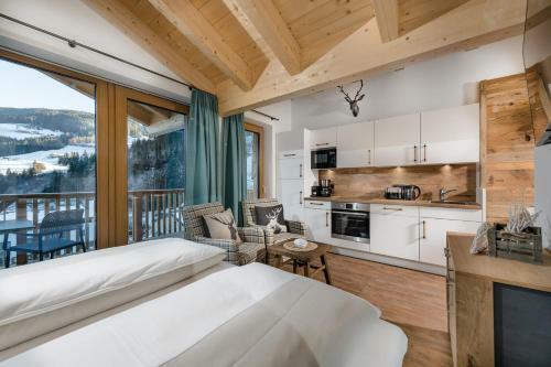 Alpenparks Hotel & Apartment Hochk�nig