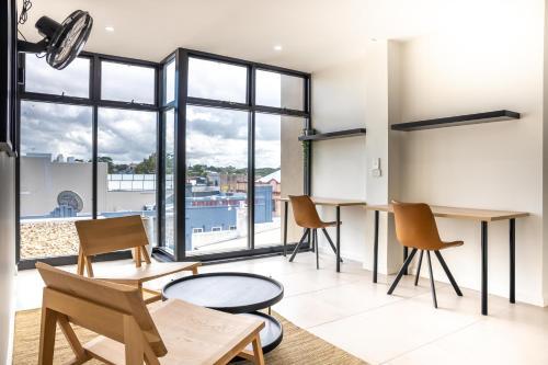 Apartamento Cosy Studio With Balcony On Newtown Dining Strip