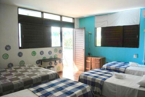 Hostal Regiane Beach Pousada Hostel