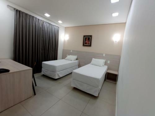 Hotel Manac�