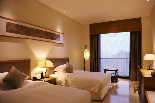 Amitabha Hotel (Fuzhou Pushang)