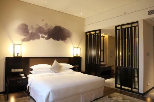 Amitabha Hotel (Fuzhou Pushang)