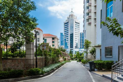 Hotel Qingdao Shinan�wusi Square�