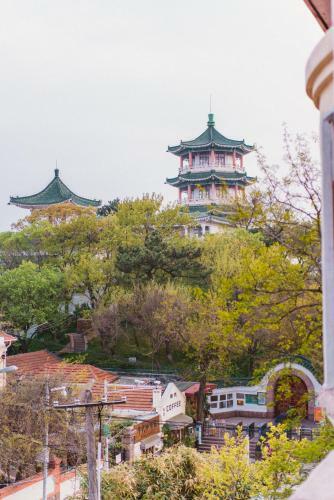Qingdao Top Yunyin Homestay