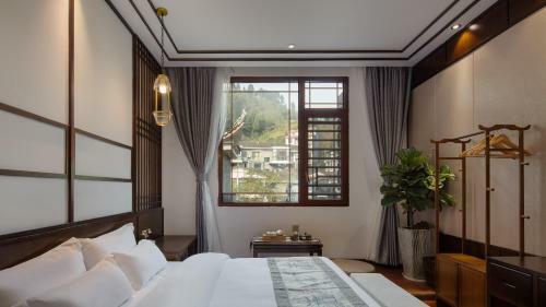 Floral Hotel Fengxue Yeguiren