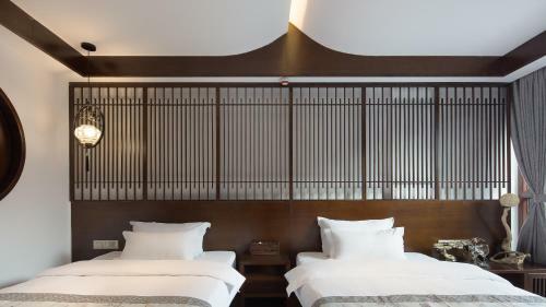 Floral Hotel Fengxue Yeguiren