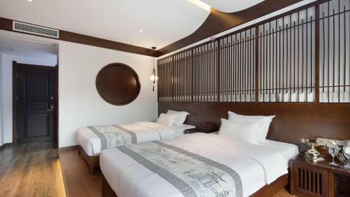 Floral Hotel Fengxue Yeguiren