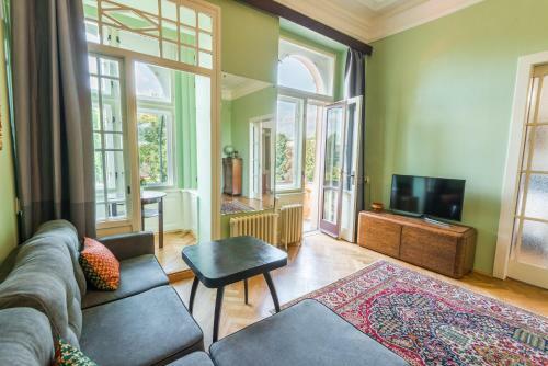 Riverside Apartment With A Balcony