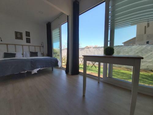 Acero Y Piedra Apartamentos Con Jard�n